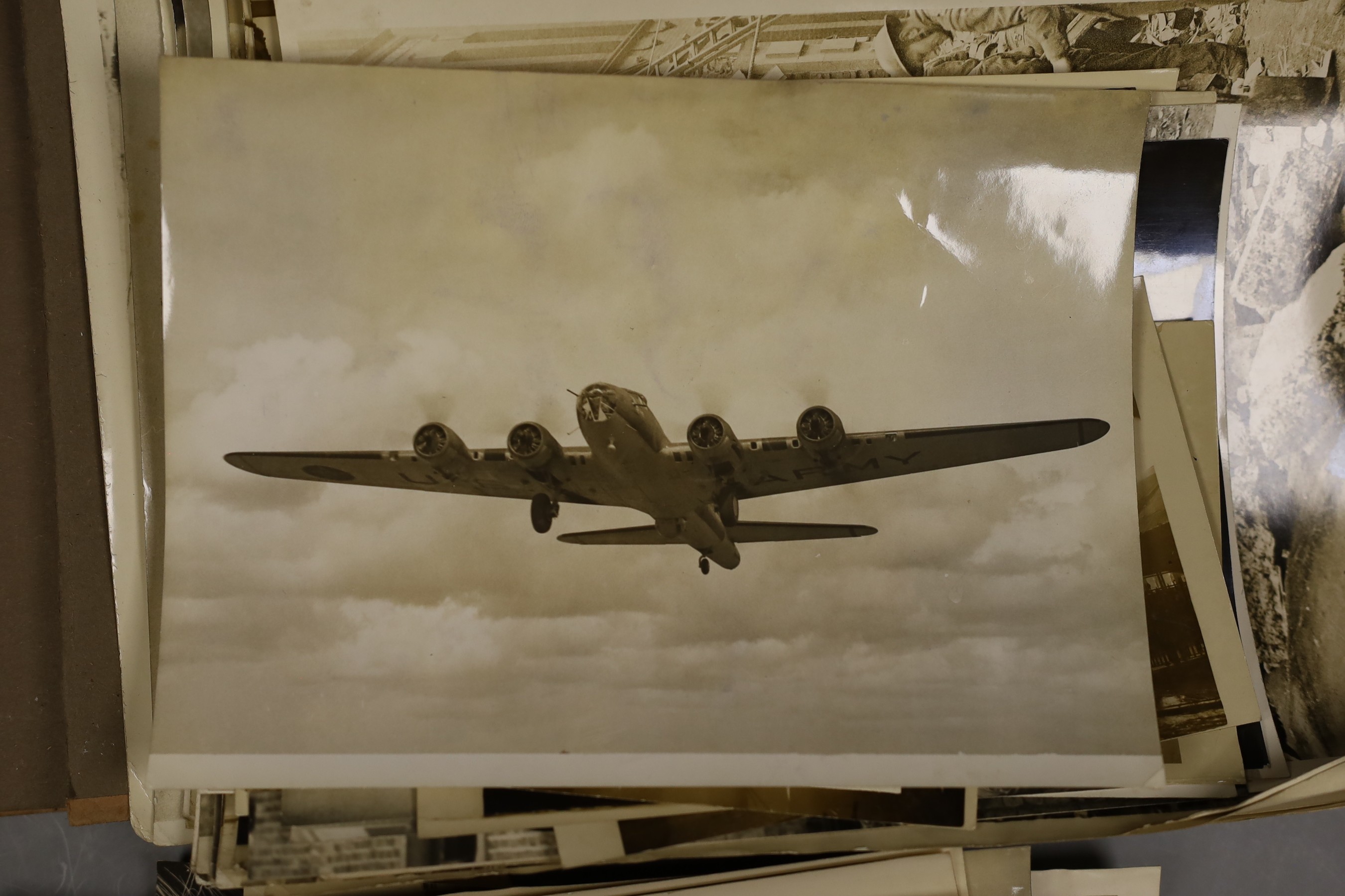 A collection of mostly WWII related photos, in album